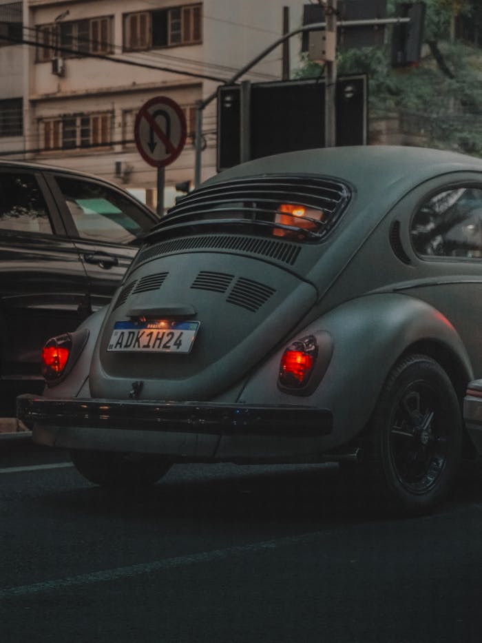 Classic Volkswagen Beetle on Urban Street at Dusk